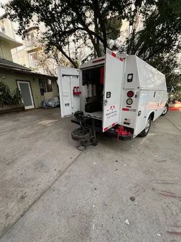 Magnet Plumbing service vehicle on-site for Sewer Line Repair in Tampa